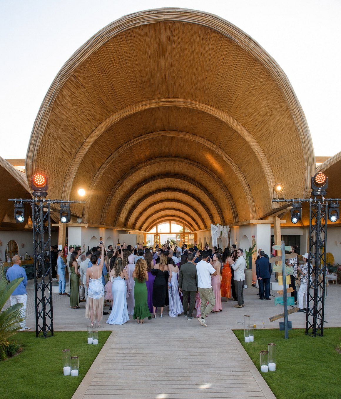 Guests celebrating under Riah's bamboo dome